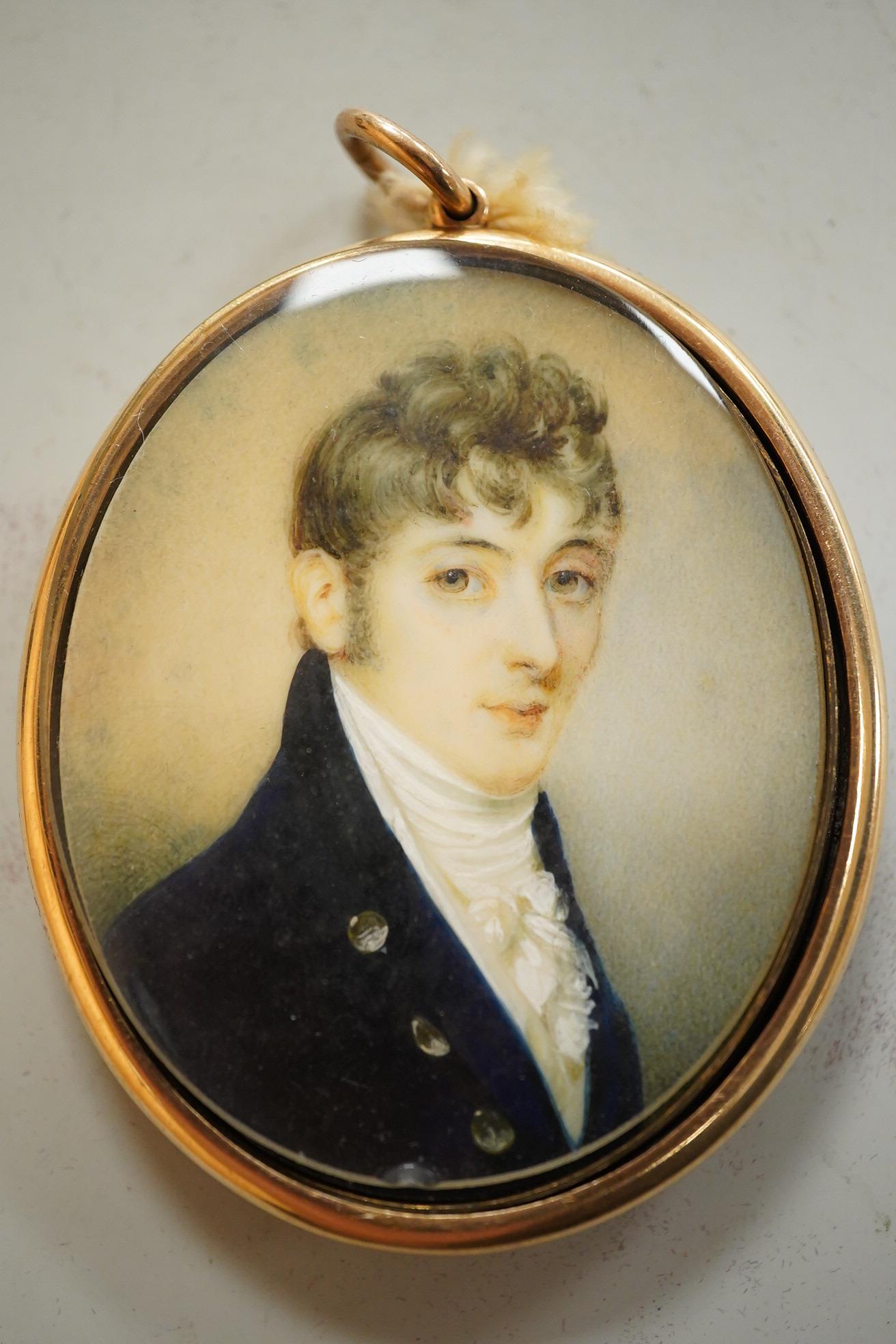 Regency School, Portrait miniature of a young gentleman, oval watercolour on ivory, housed in a yellow metal pendant frame with hairwork panel verso, glass loose, overall 7cm high - IVORY SUBMISSION BKCK66FM